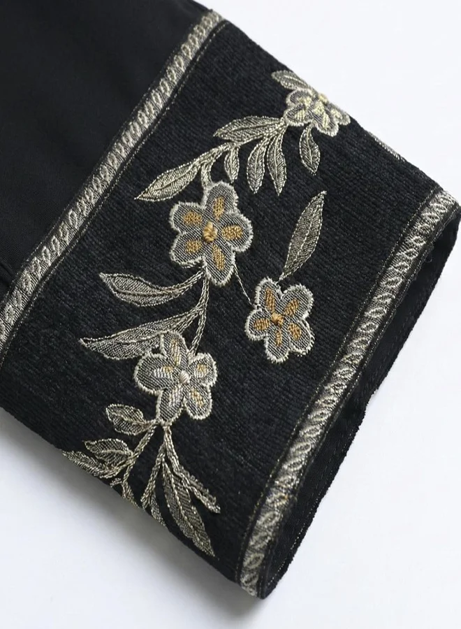 HAWRAA ABAYA Black abaya with golden embroidery on the sleeves and along the length of the abaya