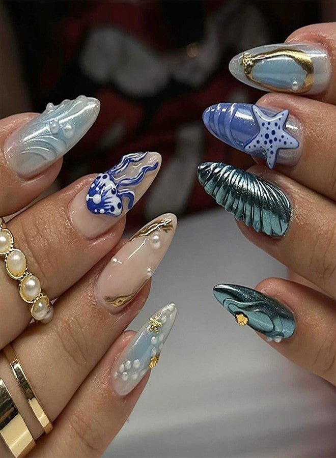 TOGZOM Summer Beach Press on Nails Medium Almond Fake Nails 3D Ocean Waves Acrylic Nails Blue Jellyfish Starfish Artificial Nails Gold Star False Nails with Pearl Designs Glue on Nails for Women Girls 24Pcs - Image 1