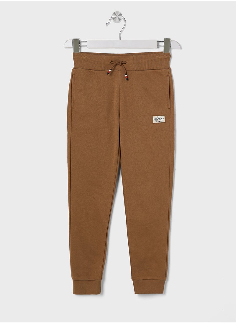 TOMMY HILFIGER Youth Monotype 1985 Label Logo Sweatpants  - Image 1