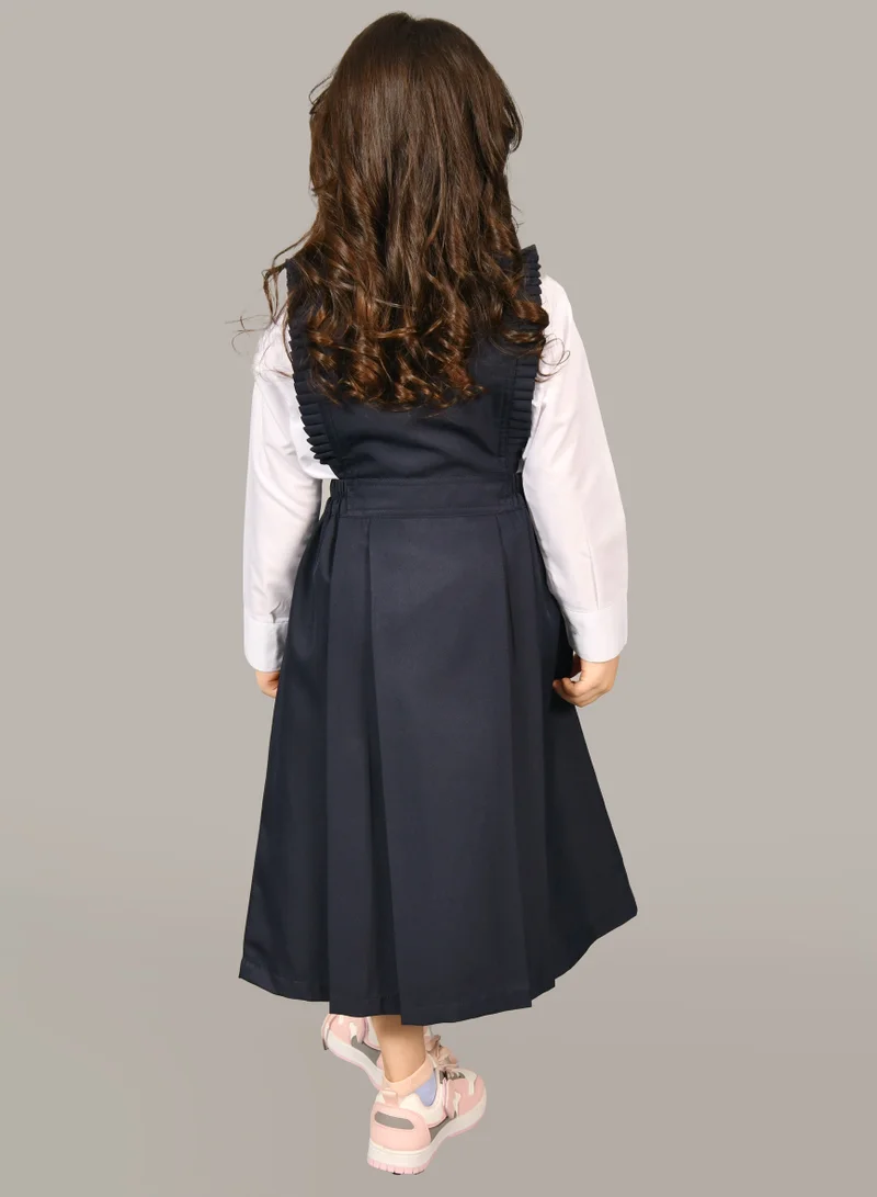 HAWRAA ABAYA Navy blue nursery apron with small ruffles, a gathered waist, and side pleats