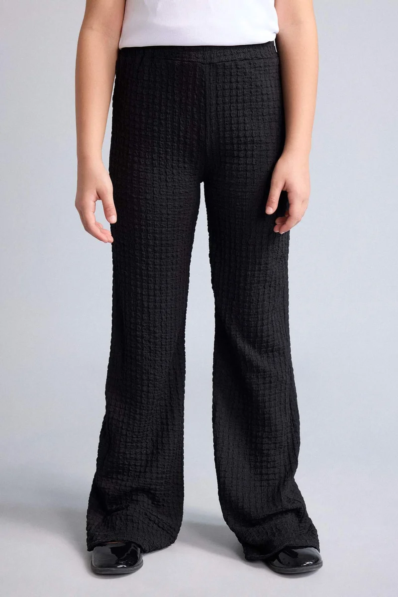 ديفاكتو Flare Trousers