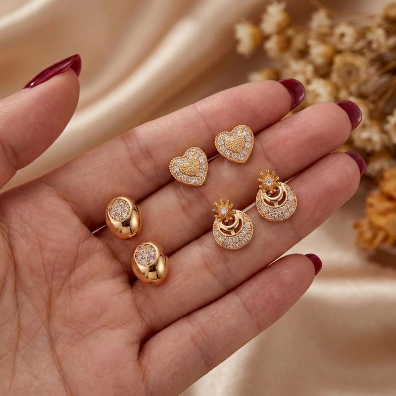 A set of 3 pairs of screw earrings in heart, oval, and crescent shapes, adorned with sparkling zircon stones. A sophisticated design that offers versatility and elegance for everyday wear. - Image 4