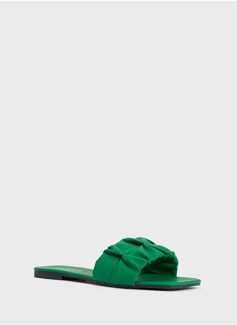 ايلا Ruched Strap Flat Sandal