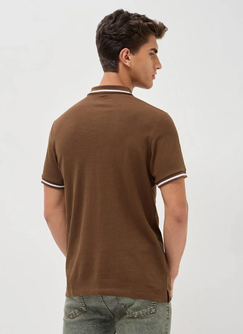 Urbano Fashion  Urbano Fashion Men's Dark Brown Solid Regular Fit Half Sleeve Cotton Polo T-Shirt for Men | Best Price UAE