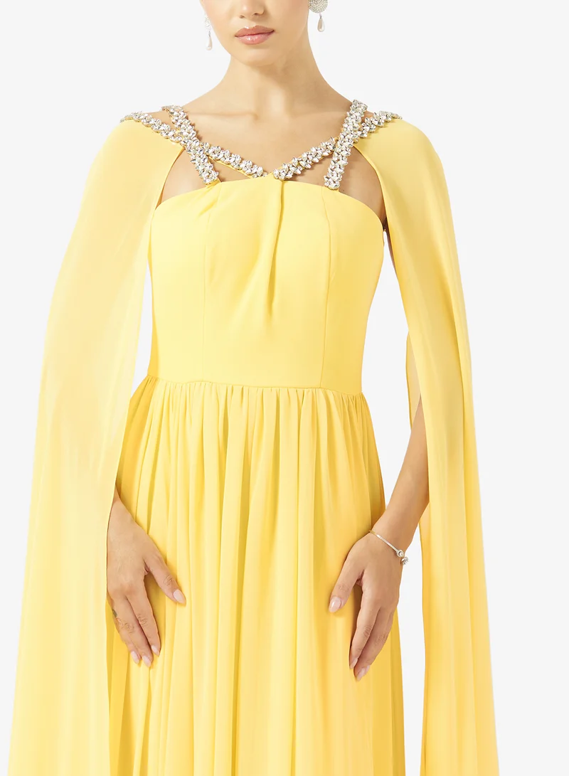 Akadia Fashion  CROSS CRYSTAL BUST DETAILS CREPE DRESS for Women | Best Price UAE