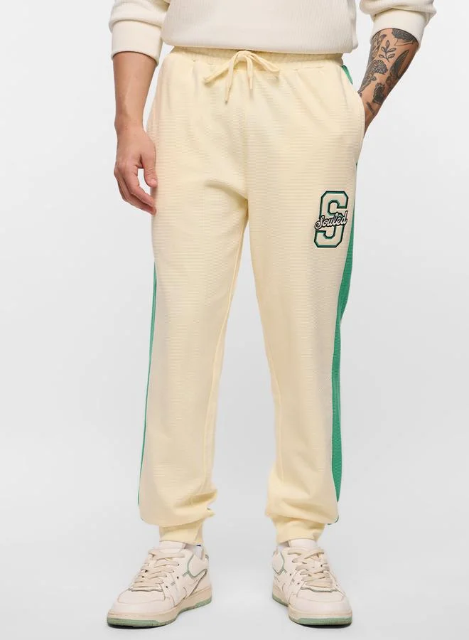 The Souled Store Men Cream Embroidered Oversized Joggers