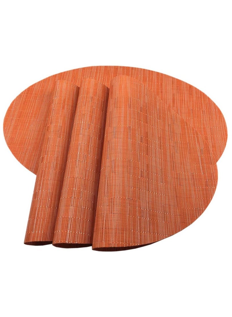 آنا طقم 4 قطع من حصائر الطعام الدائرية المضادة للانزلاق والمائيّة بقطر 35 سم، بتصميم يشبه خشب البامبو - مثالية للمناسبات العائلية وتناول الطعام في الهواء الطلق. - Image 1