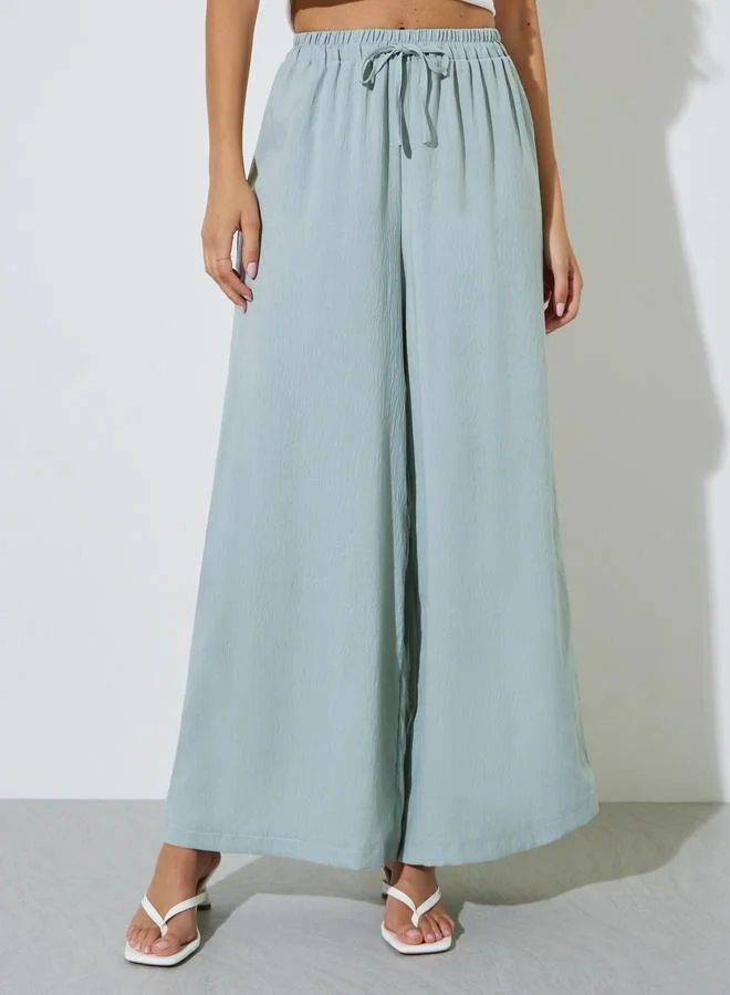 Styli Blue Solid Drawstring Waist Wide Leg Pants
