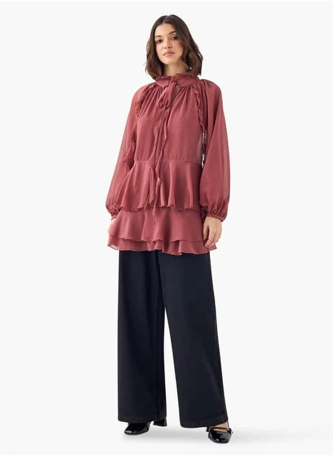ايكونيك Iconic Ruffle Detail Top with Tie-Up Neck and Long Sleeves
