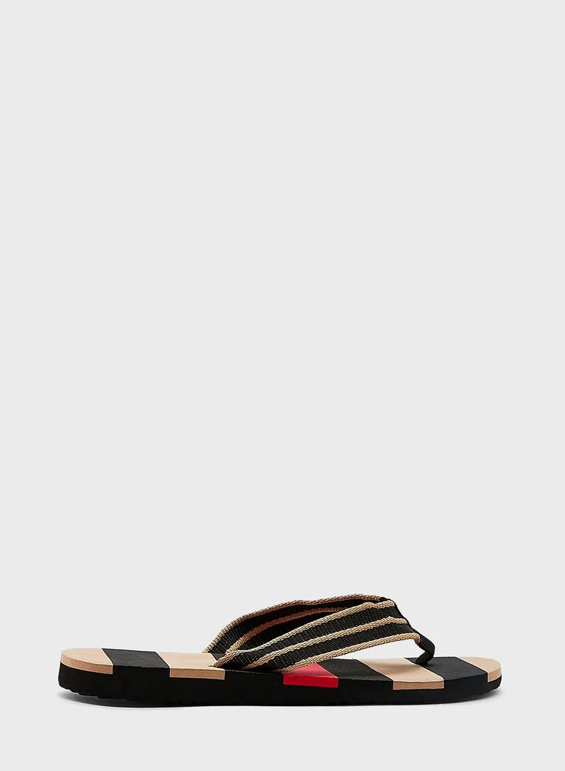 Seventy Five Striped Summer Flip Flops