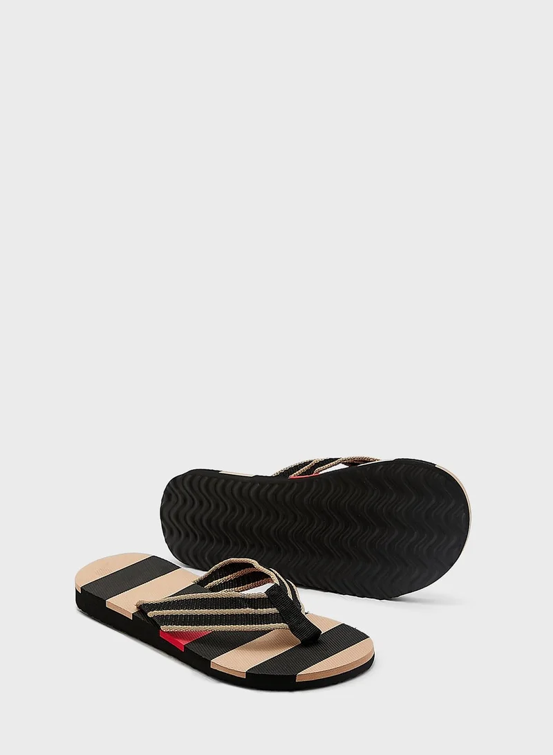 Seventy Five Striped Summer Flip Flops