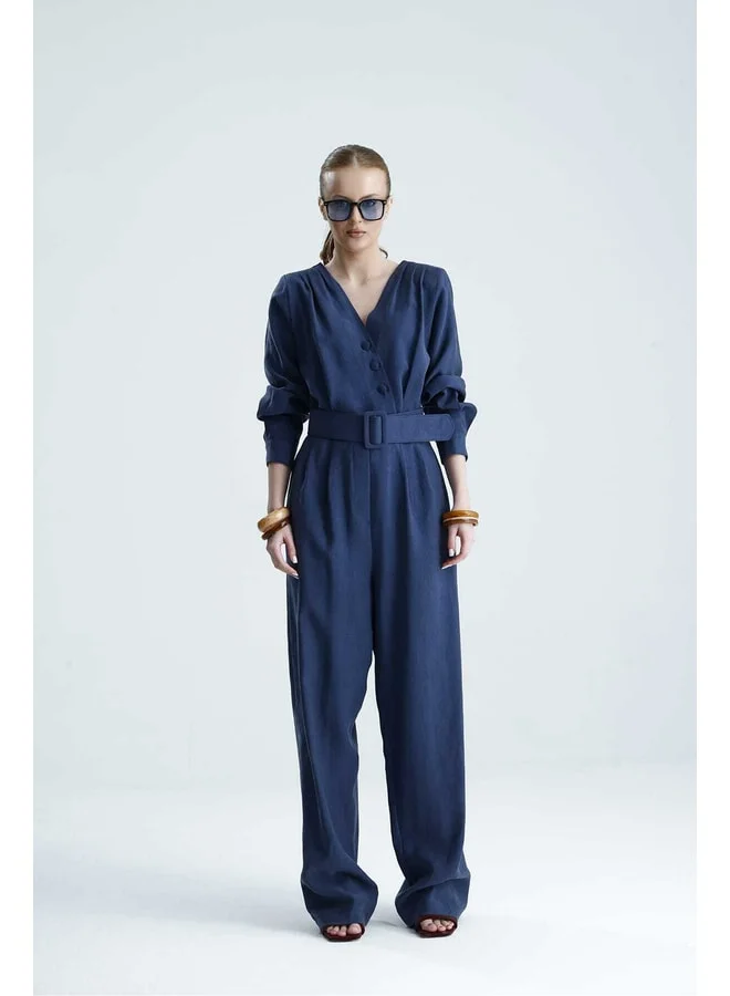 GACACOLLECTION ADARA Belted Indigo Cross-Collar Jumpsuit.