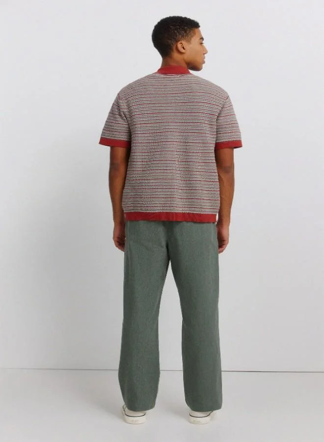 Springfield  Linen/cotton trousers with side seam pockets. It has an elasticated waistband at the back and an internal drawstring for a better fit. Back welt pockets. Straight fit. for Men | Best Price UAE