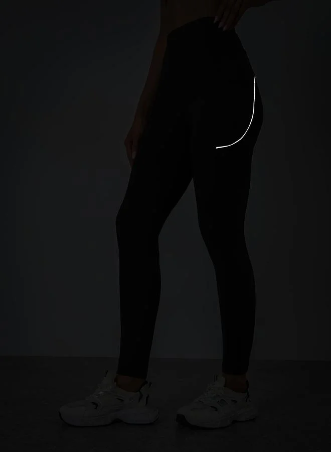 Styli Active  Women Back Reflective Black Leggings for Women | Best Price UAE