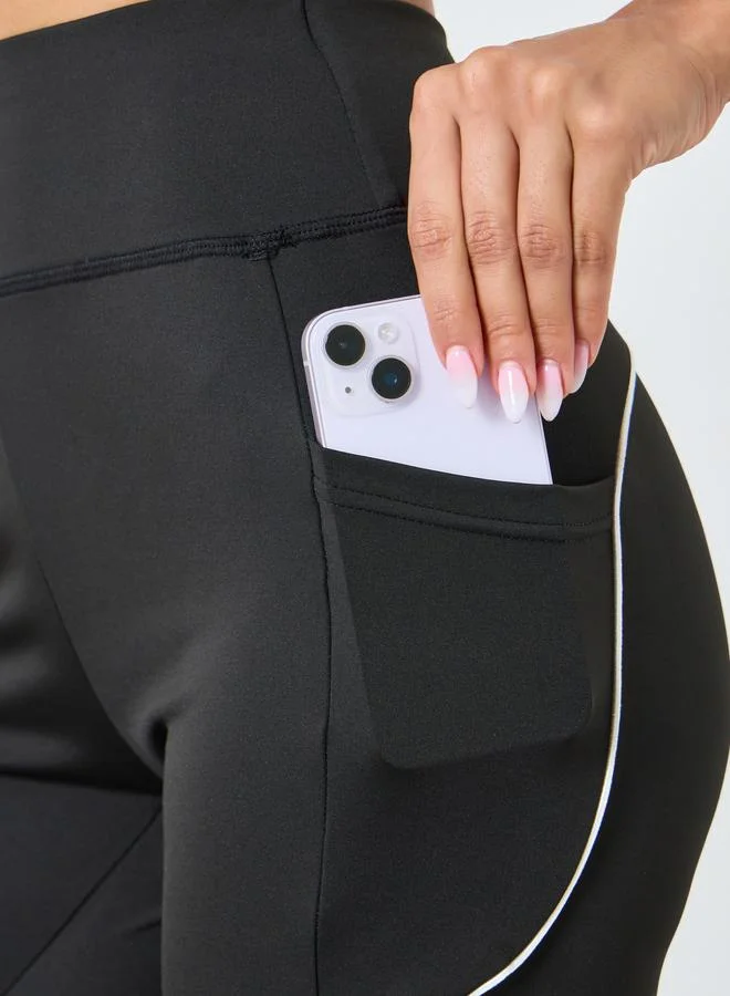 Styli Active  Women Back Reflective Black Leggings for Women | Best Price UAE