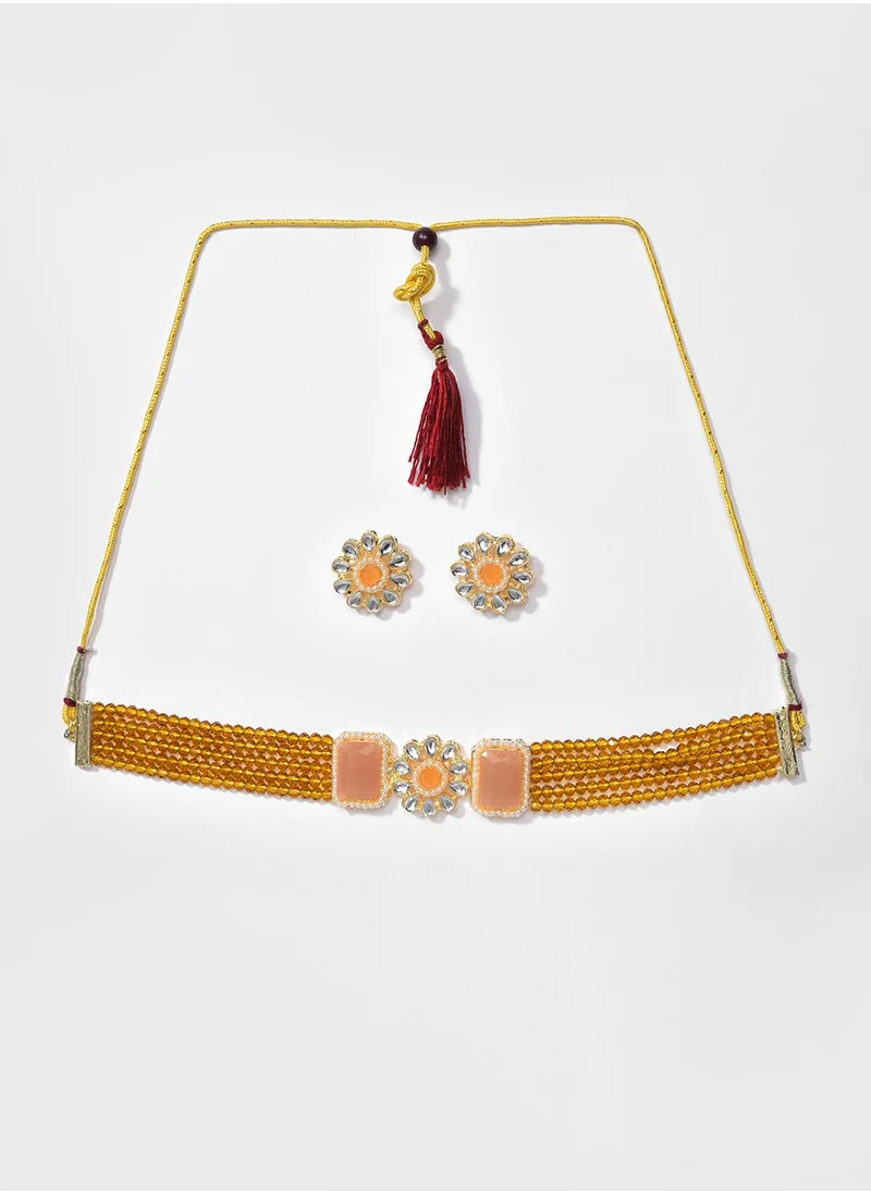 SOHI Orange & White Stone-Studded & Beaded Jewellery Set