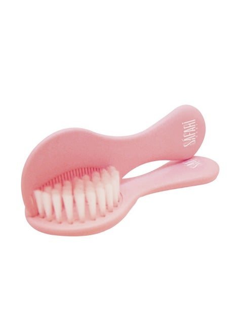 Soft pink brush and comb