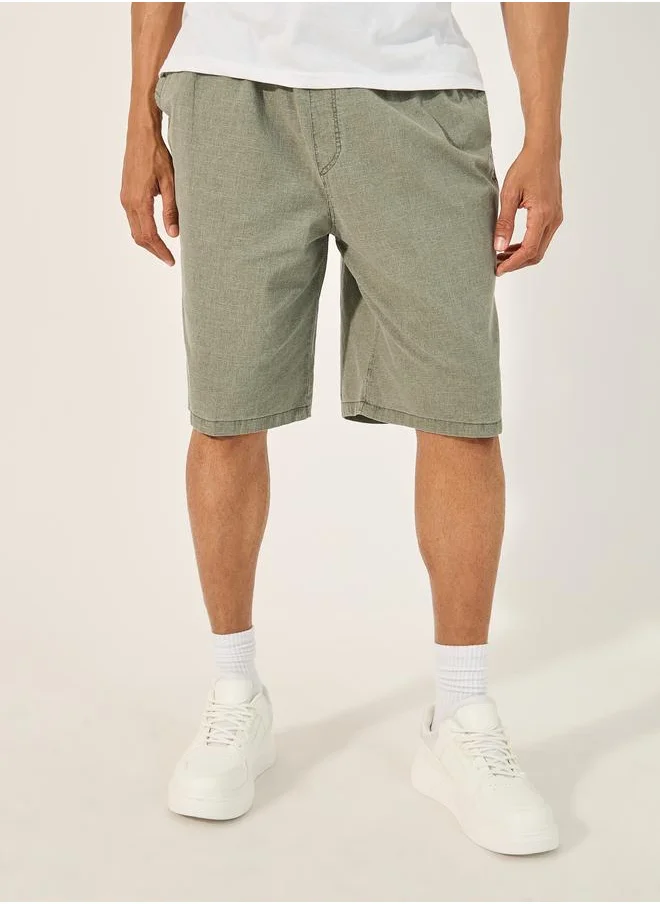 ستايلي Styli Mid Rise Stretch Loose Fit Woven Shorts
