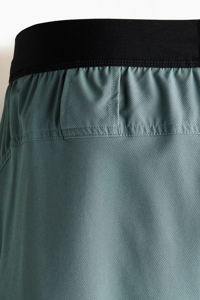 H&M  Double-layered sports shorts with DryMove™ for Men | Best Price UAE