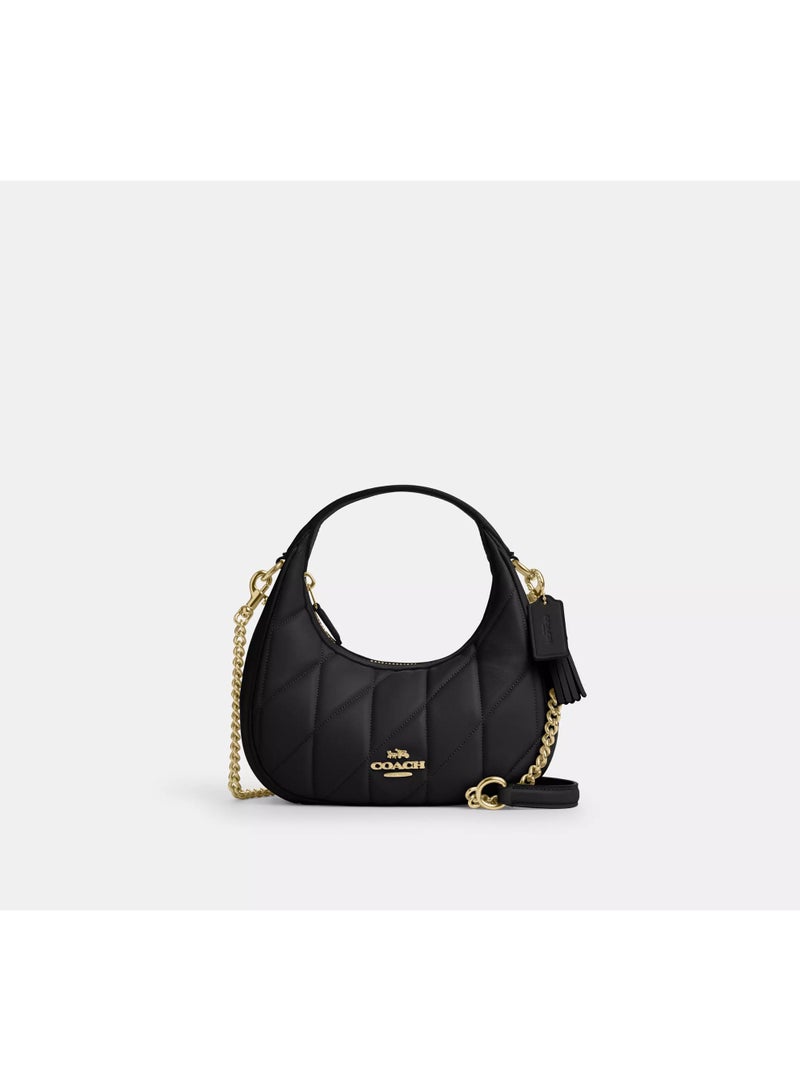 coachoutlet The original Coach Nolita 19 bag – classic elegance with the famous monogram pattern. - Image 1
