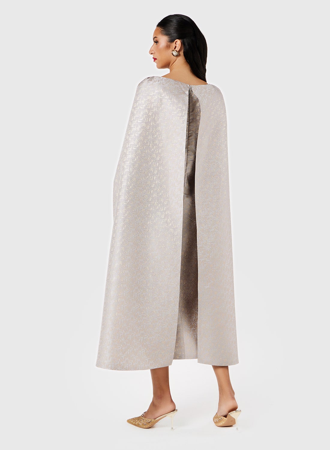 Embellished Cape Midi Dress - https://f.nooncdn.com/p/pzsku/Z84CFAFDD3792647E1C6EZ/45/_/1738215998/aed9e356-c4db-4ef1-a71a-ab7c19bc8827.jpg?width=original