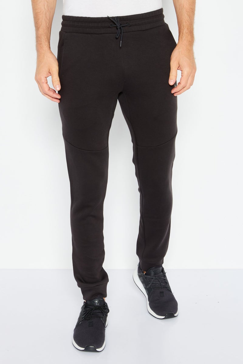 PUMA Men Slim Fit Training Sweatpants, Black - Image 1