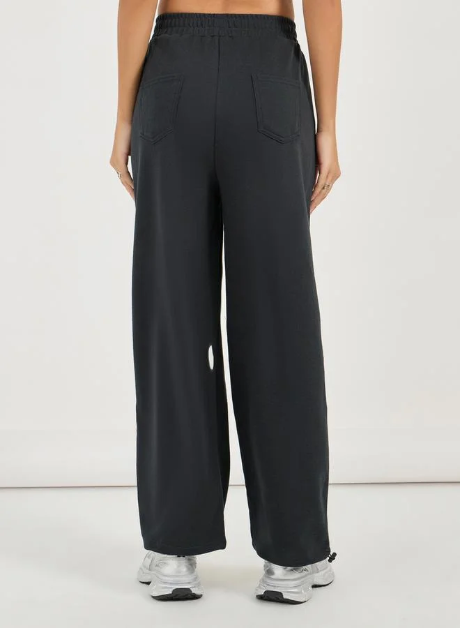 Styli Solid Wide Leg Joggers with Elasticated Waistband