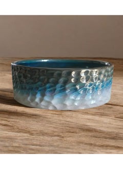 A pottery and porcelain casserole that can withstand direct and indirect heat, flame or oven.