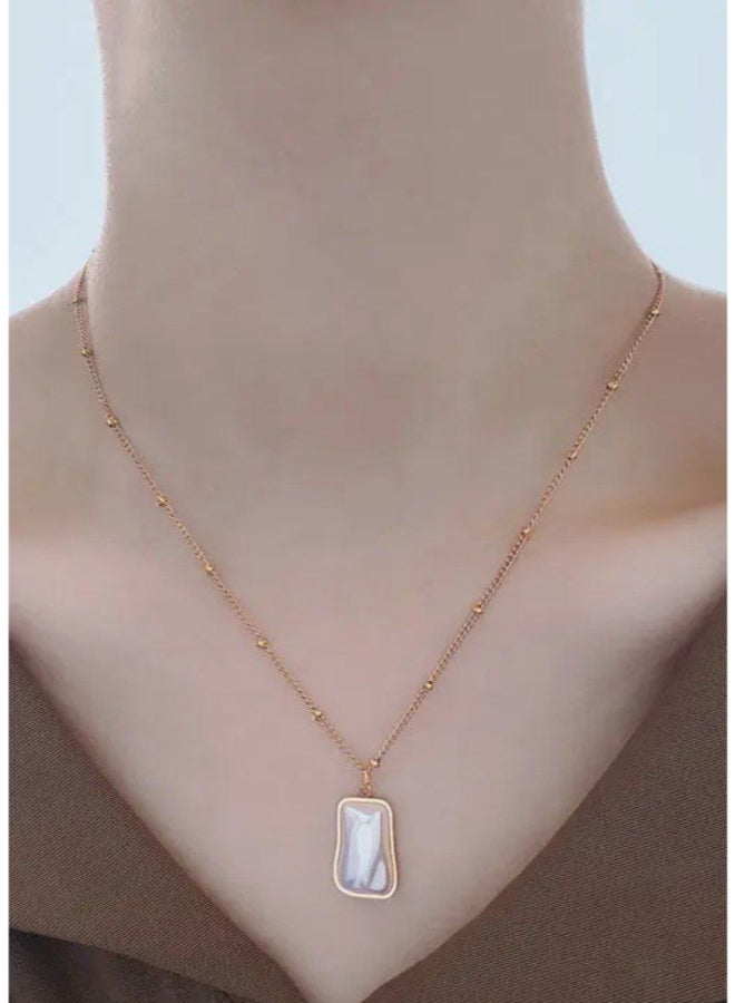 The Black Pearl Accessories Golden Stainless Steel Glowy White Clamshell Penant Necklace - Image 3