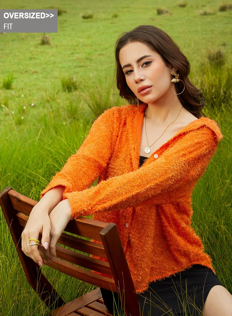 Campus Sutra Women's Pumpkin Orange Sherpa Oversized Shirt For Casual Wear | Spread Collar | Long Sleeve | Button Closure | Oversized Shirt Crafted With Comfort Fit For Everyday Wear