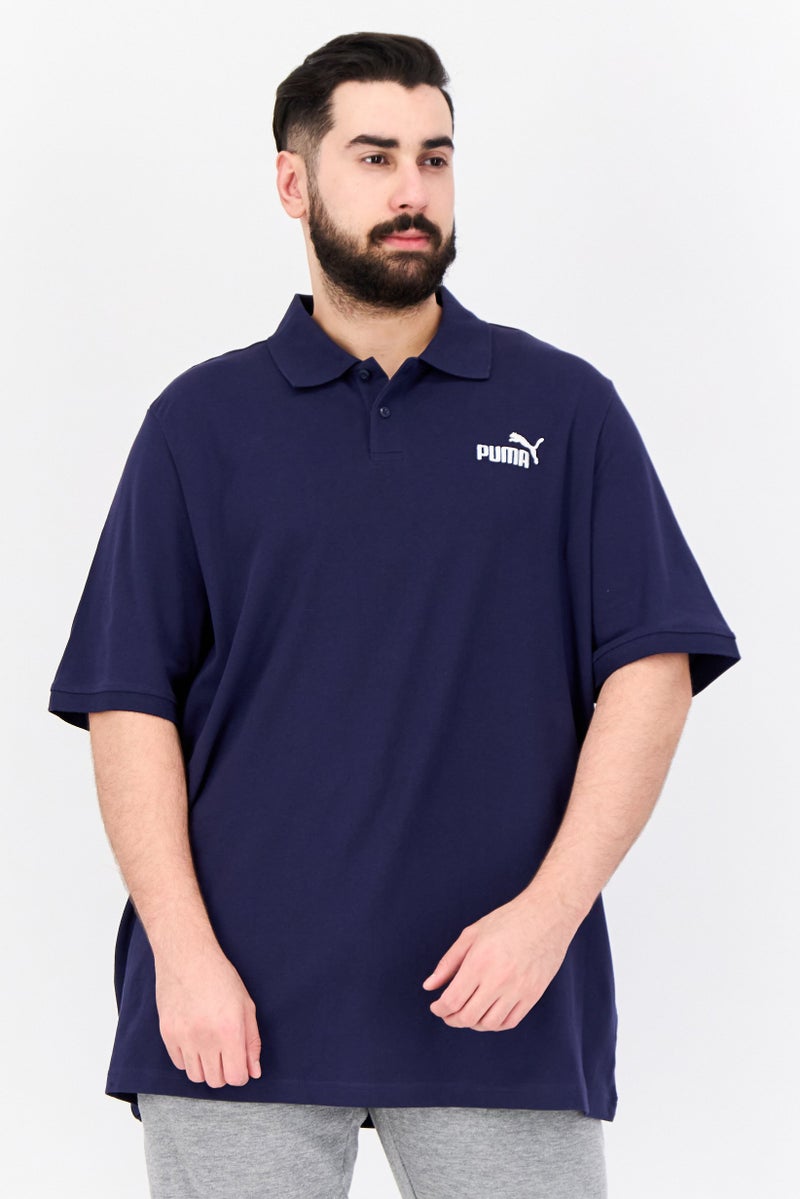 PUMA Men Sportswear Fit Brand Logo Training Polo Shirts, Navy - Image 1