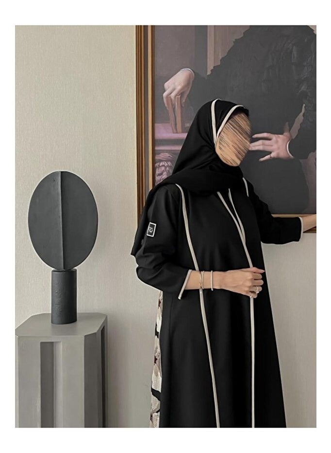 Crater Elegant, modern abaya with a floral pattern on the back. The abaya has a quarter-circle cut and includes a headscarf. - Image 5