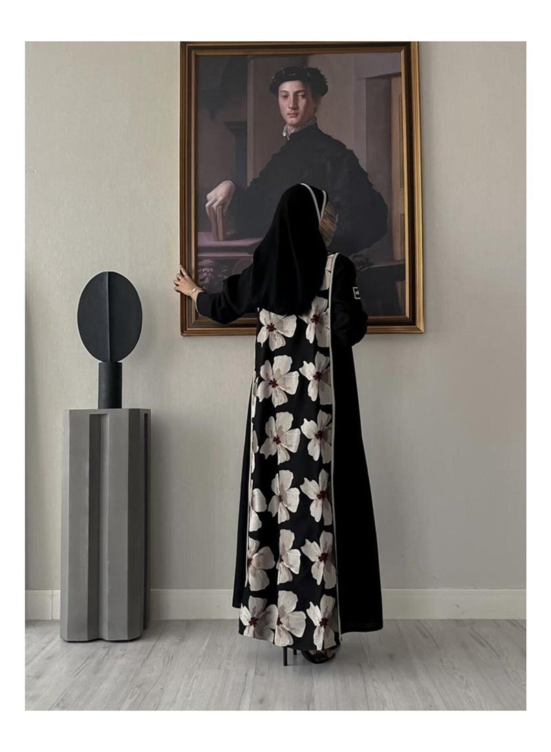 Crater Elegant, modern abaya with a floral pattern on the back. The abaya has a quarter-circle cut and includes a headscarf. - Image 2