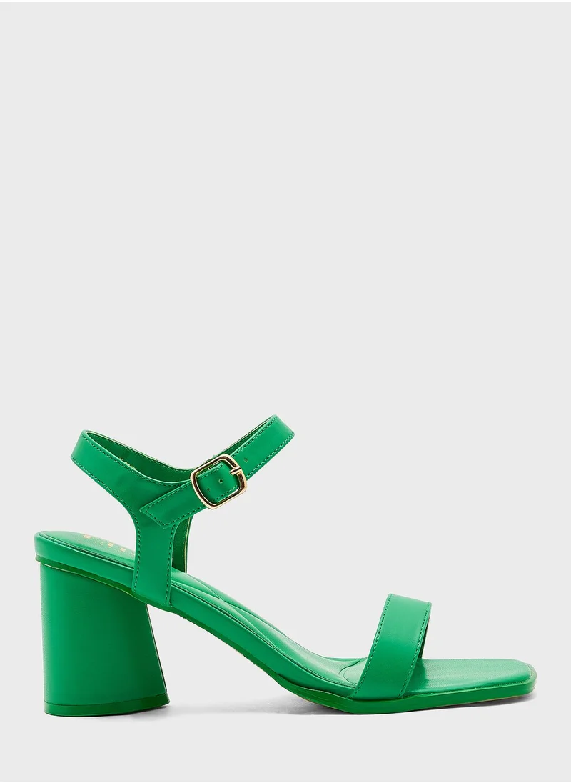 ايلا Ankle Strap Mid Block Heel Sandal