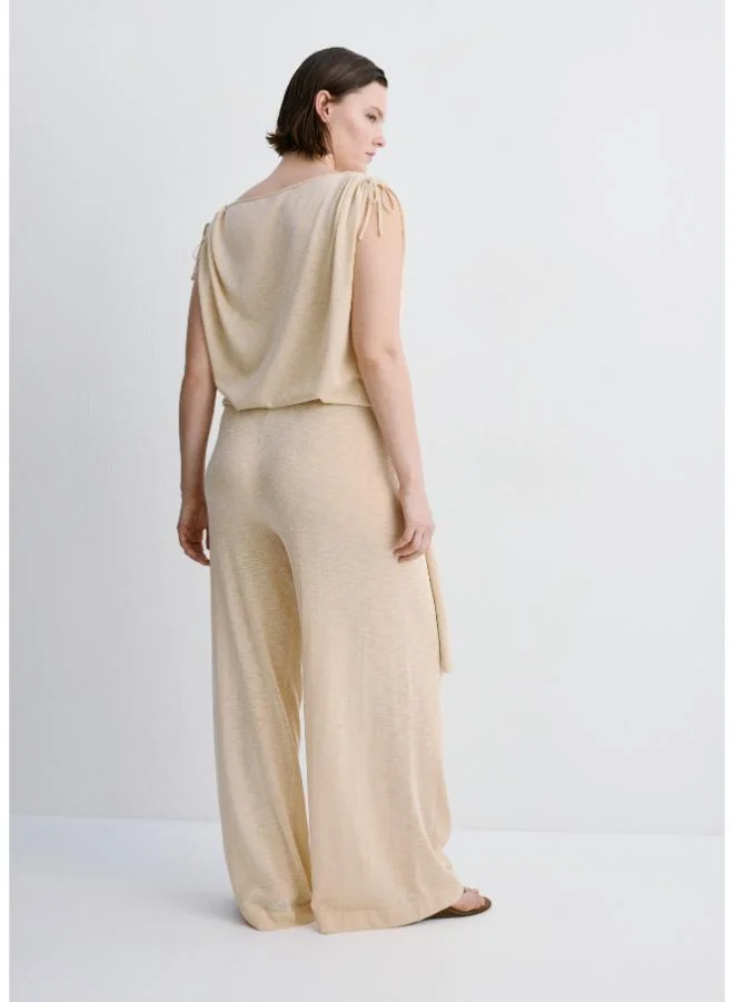 مانجو Fine knit trousers with knot detail