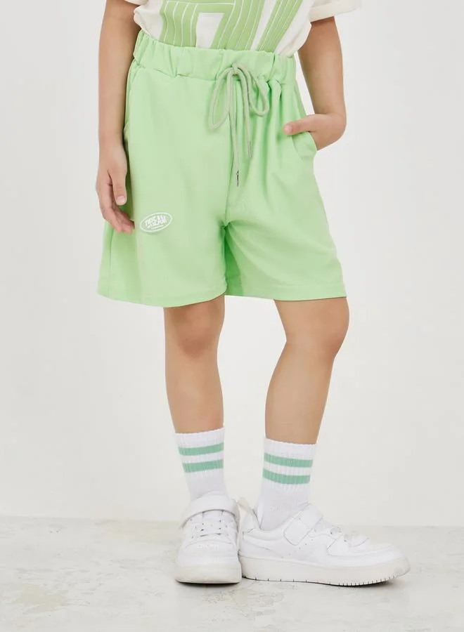 Styli Converged Fold Sticker Patch T-Shirt & Short Set