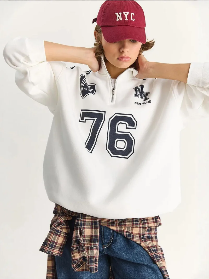 Bianco Lucci LUCCI Printed V-Neck Long Sleeve Relaxed Sweatshirt