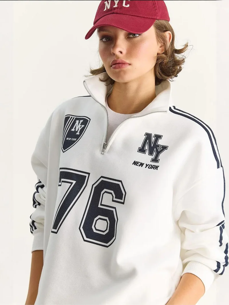 Bianco Lucci LUCCI Printed V-Neck Long Sleeve Relaxed Sweatshirt