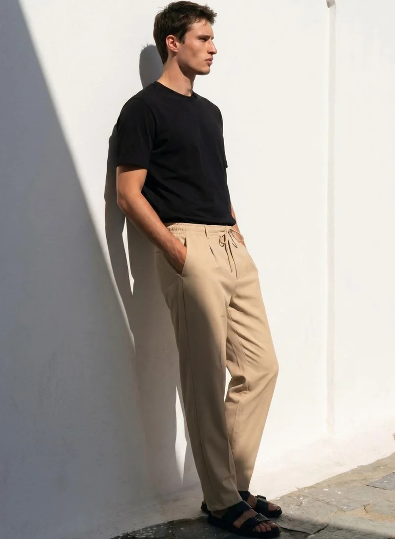 Dennis Lingo  Men Beige Lycra Solid Full Cargo Straight Trouser for Men | Best Price UAE