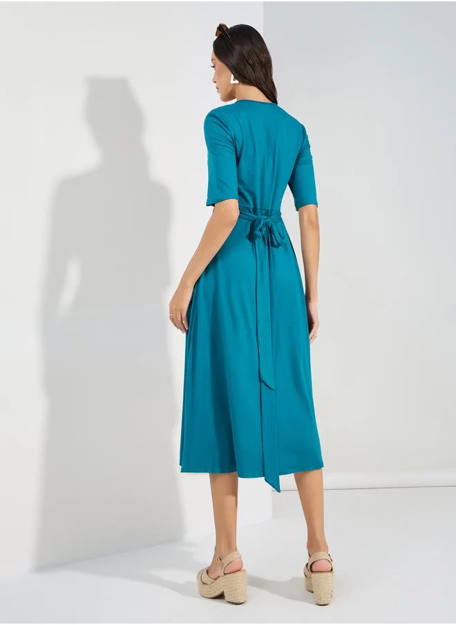 ستايلي Solid Wrap Midi Dress