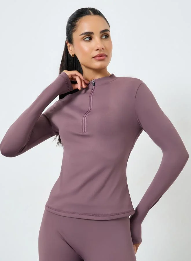 ستايلي اكتيف مجموعة من بلوزة بنصف سحاب وأكمام بفتحة إبهام وتفاصيل شبكية مع ليقنز