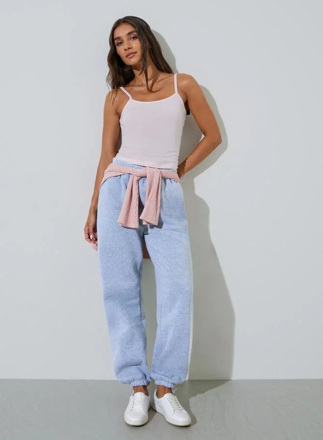ستايلي Fitted Solid Scoop Neck Strappy Tank