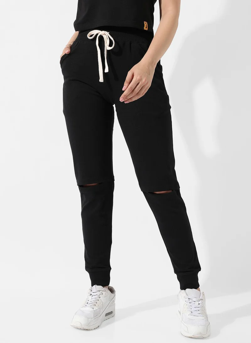 كامبوس سوترا بنطال رياضي أسود سادة بطول الركبة للنساء