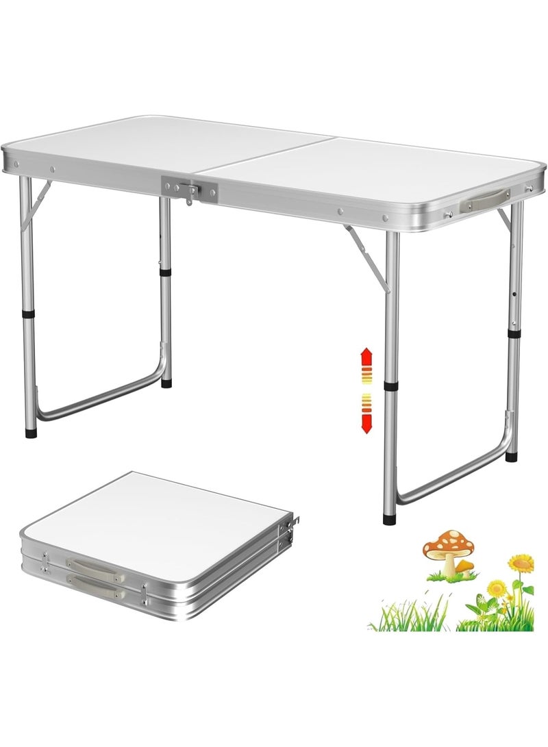 SKY-TOUCH طاولة تخييم قابلة للطي، طاولة نزهة من سبائك الألمنيوم، طاولة تخييم خفيفة الوزن لحفلة الشواء، تطوى إلى نصفين مع مقبض حمل، بيضاء (120×60×70 سم) - Image 1