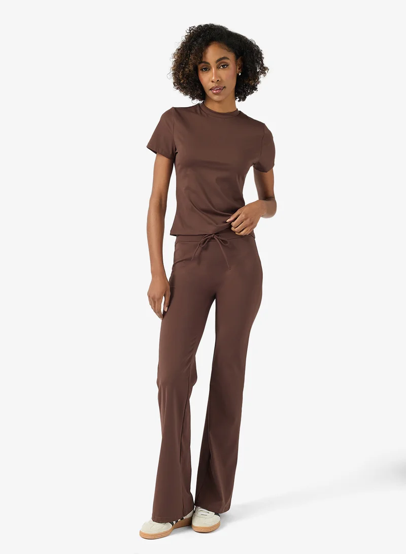 فورورد Sculpting Training T-shirt & Flared Legging Set
