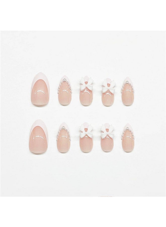 LRKNNO 24Pcs Almond Press On Nails French Tips Short Fake Nails With Cute Bow Charms Design French Press On False Nails Nude Pink Acrylic Nails Almond Shaped Artificial Nails For Women Girls Manicure Tip - Image 3