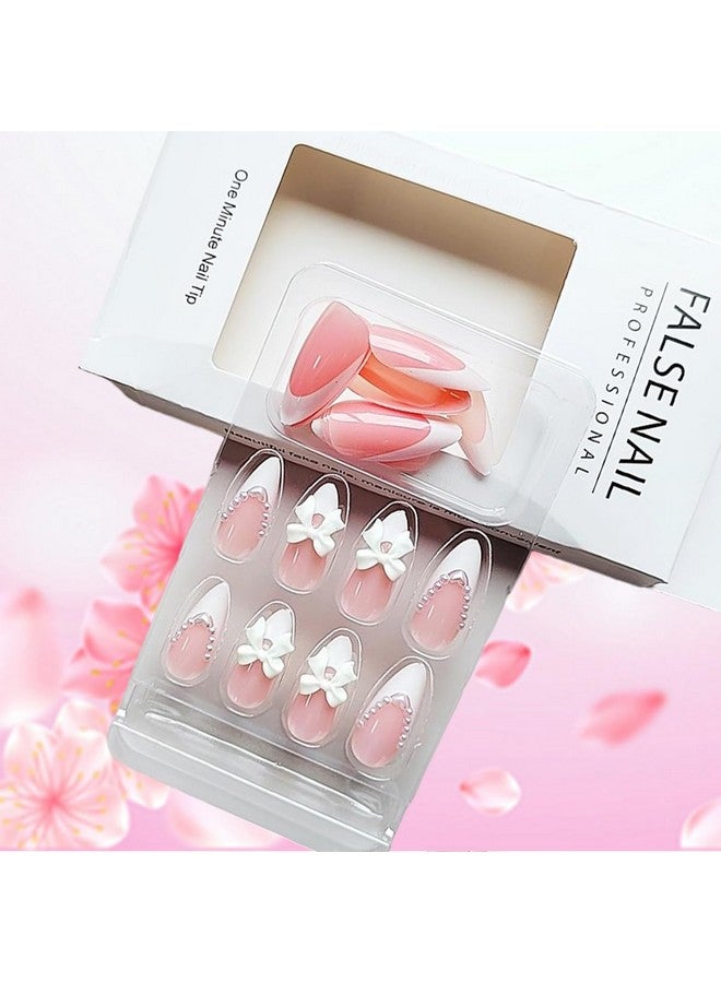 LRKNNO 24Pcs Almond Press On Nails French Tips Short Fake Nails With Cute Bow Charms Design French Press On False Nails Nude Pink Acrylic Nails Almond Shaped Artificial Nails For Women Girls Manicure Tip - Image 4
