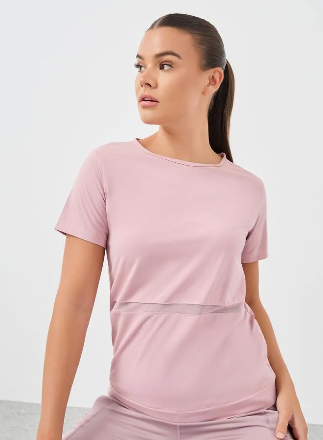 ستايلي اكتيف بلوزة قصيرة بأكمام قصيرة وخصر مزخرف بشبكة خلفية