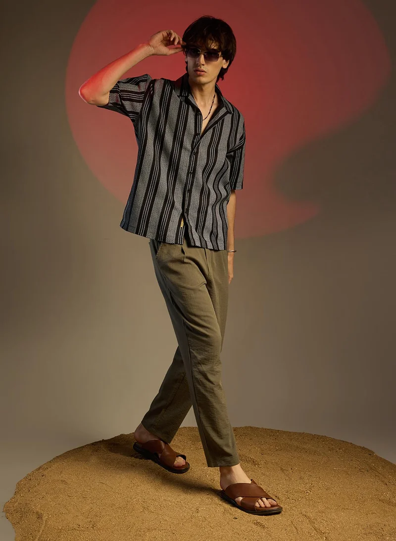Campus Sutra Campus Sutra Men's Obsidian Black Woven Striped Oversized Shirt For Casual Wear | Cuban Collar | Short Sleeve | Button Closure | Oversized Shirt Crafted With Comfort Fit For Everyday Wear