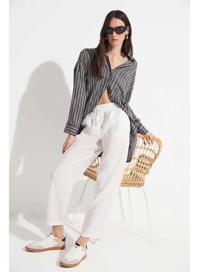 جون بنطلون جينز نسائي من مودال بمقاس مرن وخصر مطاطي بلون إيكرو - Image 1